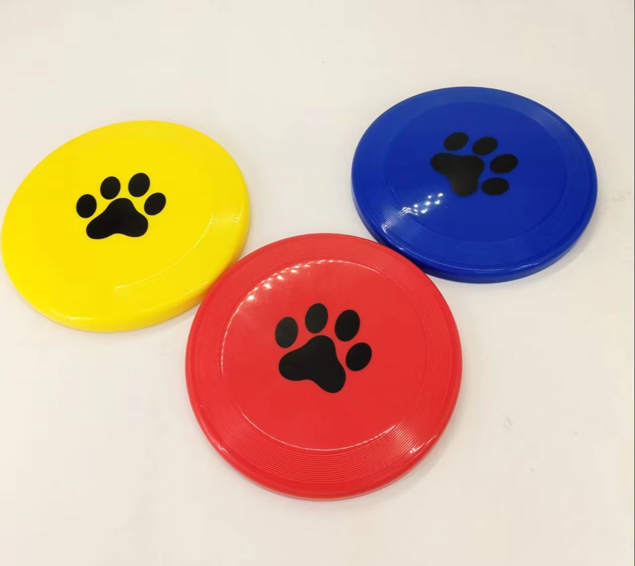 Flying Disc Dog Training Toy - Hard Plastic Dog Frisbee Paw Print